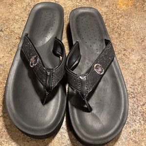 MK flip flops, glittered